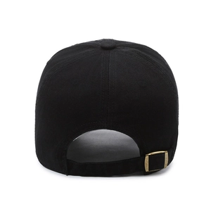 Rear view of black cotton baseball cap with adjustable strap and brass metal buckle