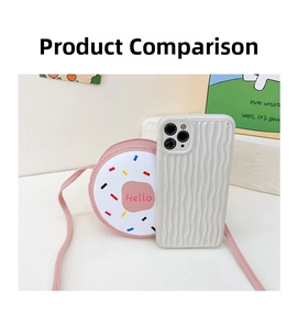 Pink donut crossbody bag size compared to a smartphone on a clean white background