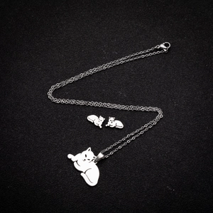 Minimalist stainless steel cat jewelry set featuring animal pendant necklace and stud earrings