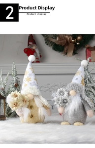 Pair of festive Christmas gnome dolls with gold and silver snowflake hats in a holiday scene.