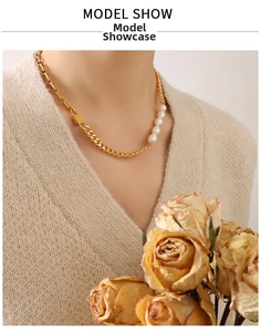 Detail of 18K gold plated thick chain necklace featuring freshwater pearls and square pendant