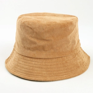 Close-up macro detail showing the high-quality fine-wale corduroy texture of the khaki hat.
