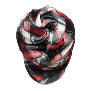 Detailed view of red and black plaid knit snood scarf with soft textured fabric