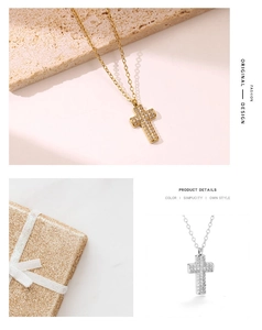 Detail of micro-pave crystal cross necklace in gold and silver with elegant gift box