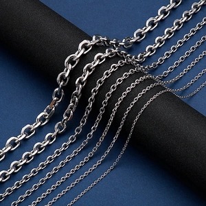Detailed view of silver stainless steel O-chains and cross links in various thicknesses