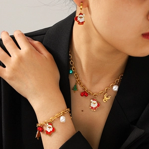 Parure de bijoux de Noël dorée avec collier, bracelet et boucles d'oreilles festives
