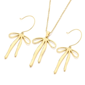 Elegant gold-tone stainless steel jewelry set featuring a ribbon bow necklace and earrings