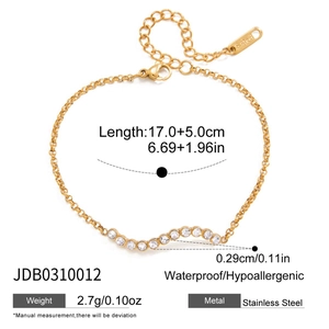 Detail of 18K gold stainless steel bracelet with white zircon heart and lobster clasp