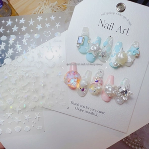 Close-up of 3D shell starfish nail stickers and ocean-themed press-on nails set