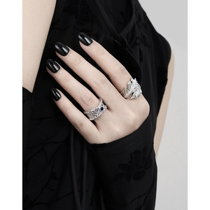 Minimalist S925 sterling silver mesh rings with blue zircon worn on female hand