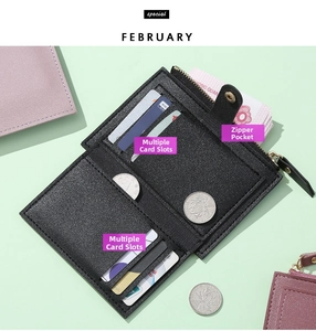 Detail view of thin black leather wallet showing multiple card slots and zipper pocket