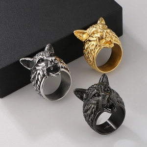 Three-color Viking wolf head rings in gold, silver, and black polished stainless steel