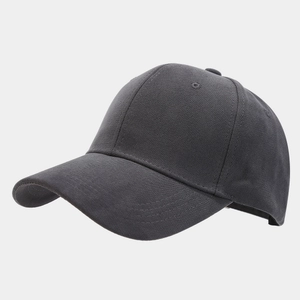 Detail of a dark grey twill cotton baseball cap showing six-panel stitching and curved brim