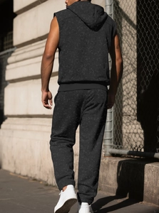 Rear view of black vintage distressed sleeveless hoodie and matching sweatpants set