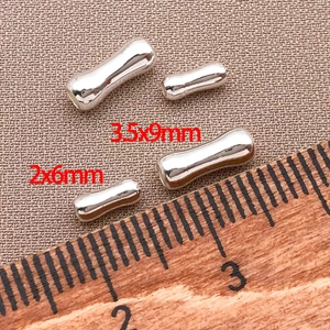 Macro di distanziatori curvi placcati oro 18k in misure 3,5x9mm e 2x6mm per gioielli fai da te
