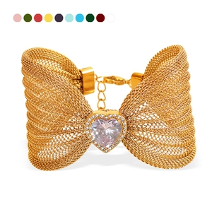 Elegant gold bow mesh bracelet with heart purple stone and diamond butterfly accents