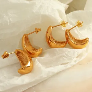 Polished gold titanium steel hollow crescent earrings with multiple backings
