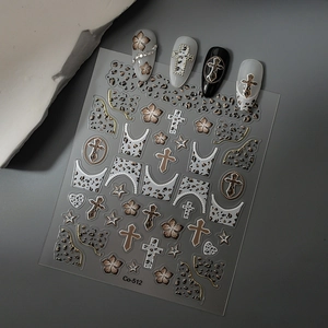 Detailed view of leopard print nail art stickers with gold foil cross and flower patterns