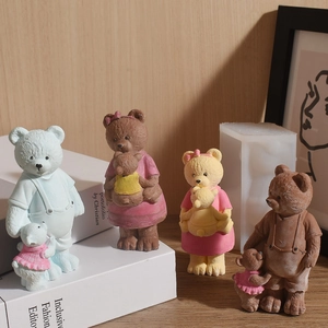 Detail of DIY teddy bear candle molds showing textured fur finish and cute family design