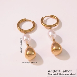 Detailed view of gold teardrop earrings with dimensions 3.18cm length and pearl accents
