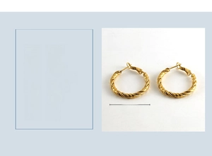 Macro view of 30mm twisted hoop earrings in 18k gold plated stainless steel