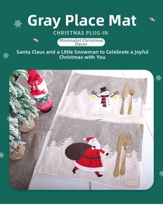 Detail of grey Christmas placemats with Santa Claus and Snowman festive patterns