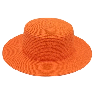Detailaufnahme der leuchtend orangen Strohhut-Struktur mit flacher Oberseite
