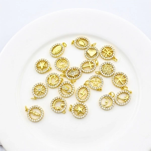 Gold-plated zircon charms with celestial and religious motifs for DIY jewelry making