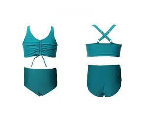 Detail of dark teal two-piece bikini with ruched front and criss-cross back straps