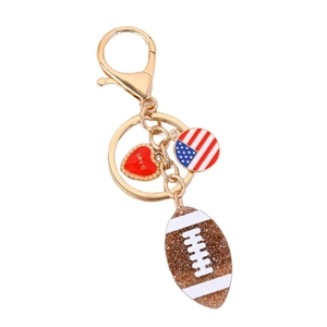 Glitter rugby football keychain with red love heart and American flag charm pendant