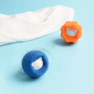 Reusable laundry lint remover sponge balls in blue and orange for anti-tangling