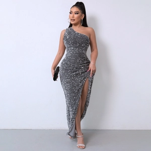 Detail view of silver sequin evening gown with one-shoulder design and high side slit