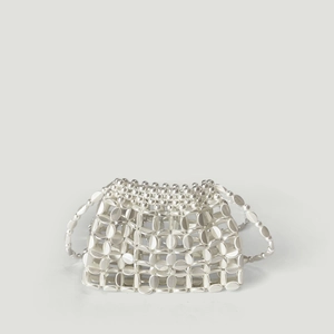 Detailed view of silver sequin woven bag with acrylic beads and hand-knitted texture