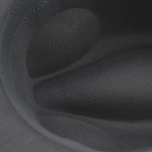 Macro detail of thick padded inner foam structure for grey flat top felt fedora hat