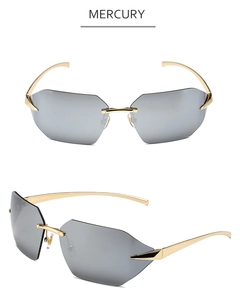 Detail of rimless mercury sunglasses with grey geometric lenses and gold metal temples