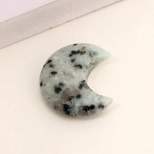 Polished kiwi jasper natural stone crescent moon ornament with green and black spots