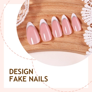 French almond press-on nails with pink base, white tips and silver glitter accents