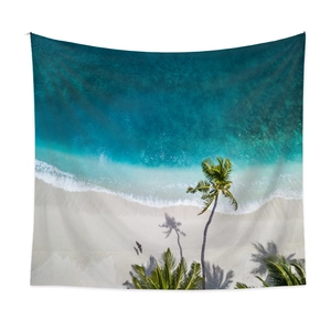 Bohemian tropical beach tapestry with aerial view of blue ocean and white sand