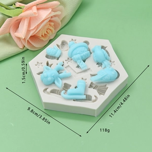 Hexagon silicone mold with Christmas deer and snowman shapes including product dimensions