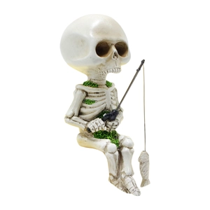 Fishing skeleton figurine made of resin with moss details for Halloween home decor