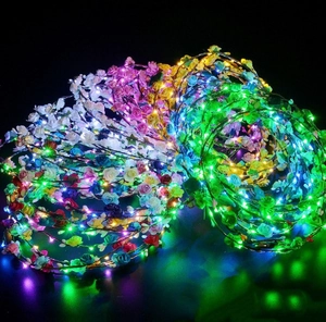 Vibrant LED glowing floral wreaths with colorful synthetic flowers for festive night parties