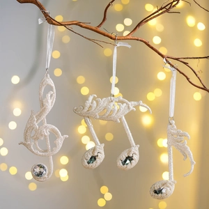 Sparkly white musical note ornaments with glitter and gems for Christmas tree decor