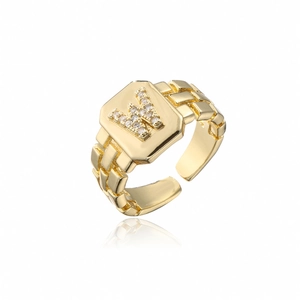 Detailed shot of 18K gold plated adjustable ring with zircon-encrusted letter W design