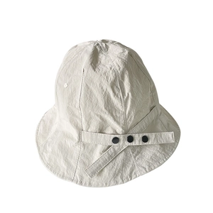 Light beige quick-dry nylon sun hat with micro-wrinkle texture and black buckles