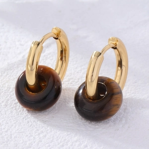 Tiger eye stone donut earrings in gold-plated stainless steel on a white background