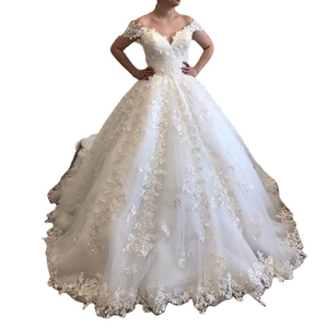 Elegant white ball gown wedding dress with lace embroidery and off-shoulder V-neck design