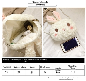 Detail view showing Lolita rabbit plush bag internal capacity for phone and keys