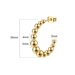 Gold stainless steel C-shaped hoop earrings with graduated beads measuring 26mm in diameter