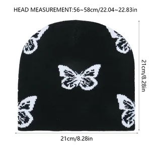 Tabella taglie berretto in maglia nera con farfalla e misura testa di 56-58 cm