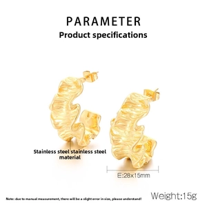 Detail showing irregular wavy gold C-shape earrings made of durable stainless steel